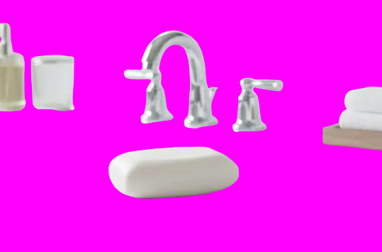 Bathroom sink with marble countertop, faucet, soap, and towels.